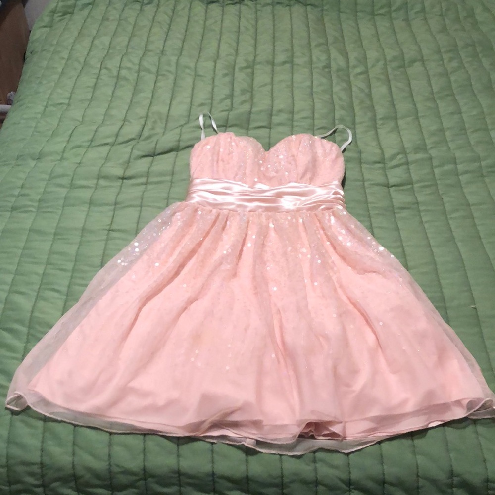 blush pink dress with holographic sequence.